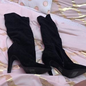 Tall black boots with heel